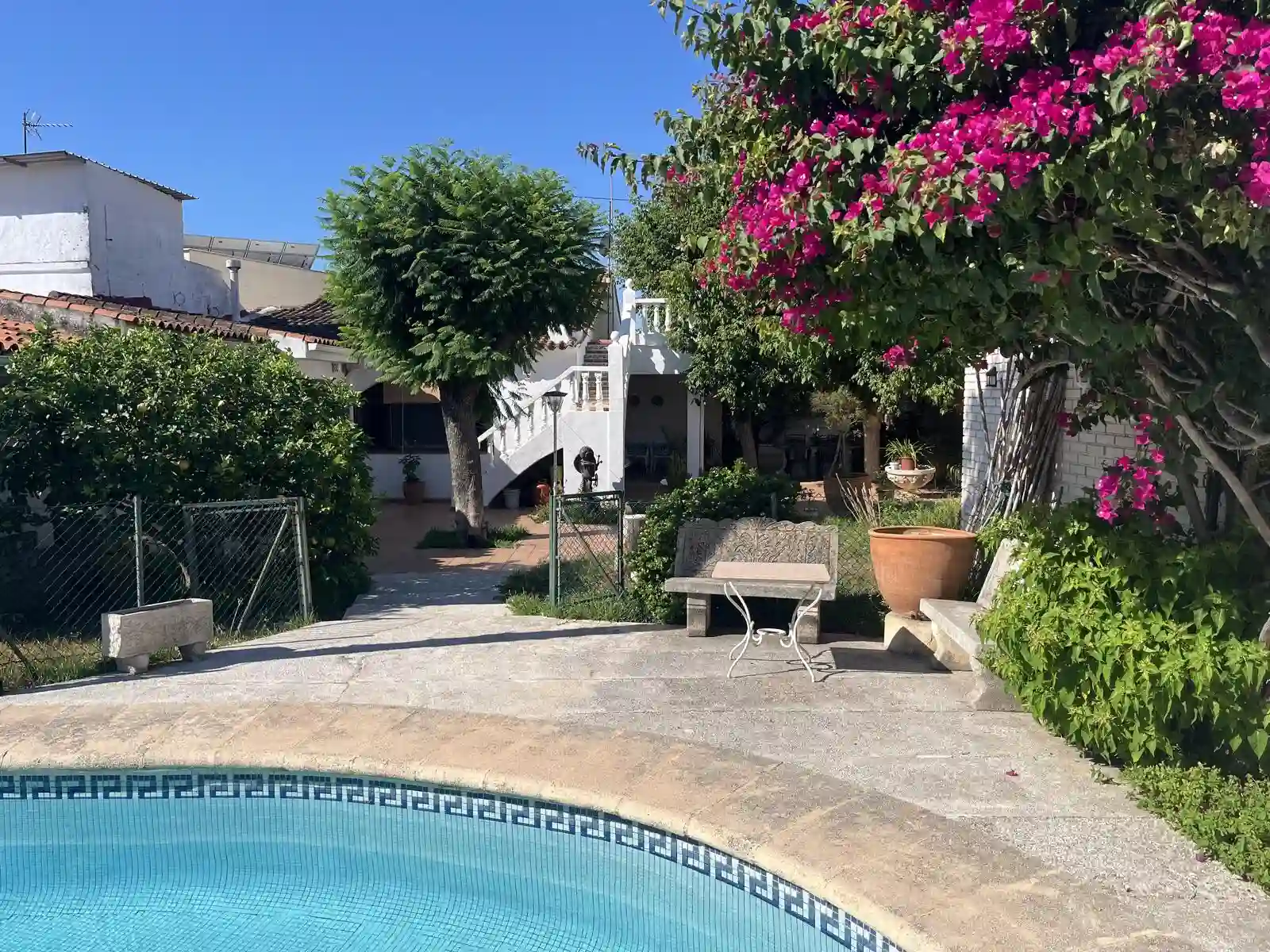 "A villa with pool and bougainvillea in the Gandía region of Valencia — the kind of property that moves quickly and rewards buyers who are prepared to act remotely"