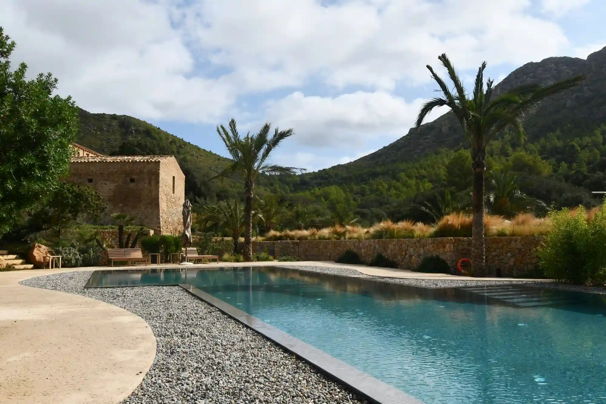 "A stone finca with pool and palm trees in the Valencia region — the kind of property that takes time, patience, and the right preparation to secure"