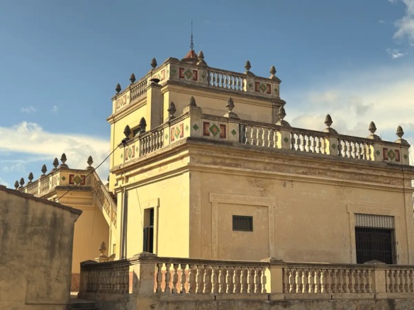 Historic Valencian country house Huerto Virgen del Rosario with tiled tower and stone balustrades