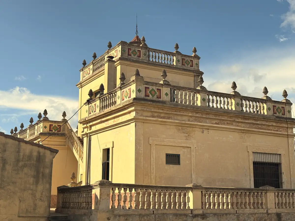 Historic Valencian country house Huerto Virgen del Rosario with tiled tower and stone balustrades