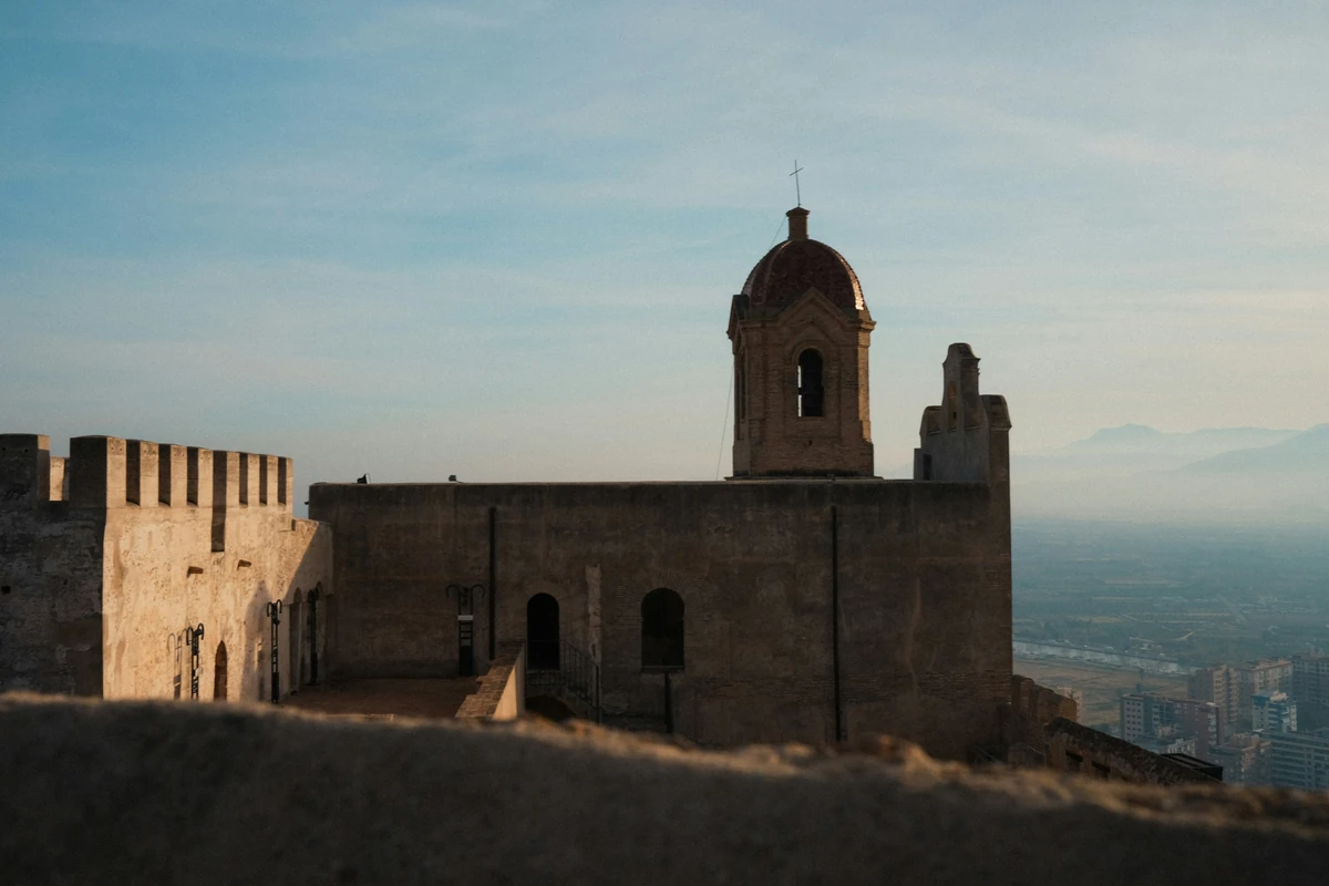 Cullera castle and sanctuary on top of the hill, with the Júcar river and the town below